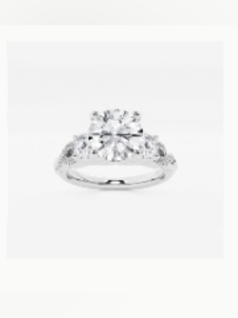 Classic Silver-Tone Solitaire Engagement Ring with Side Stones